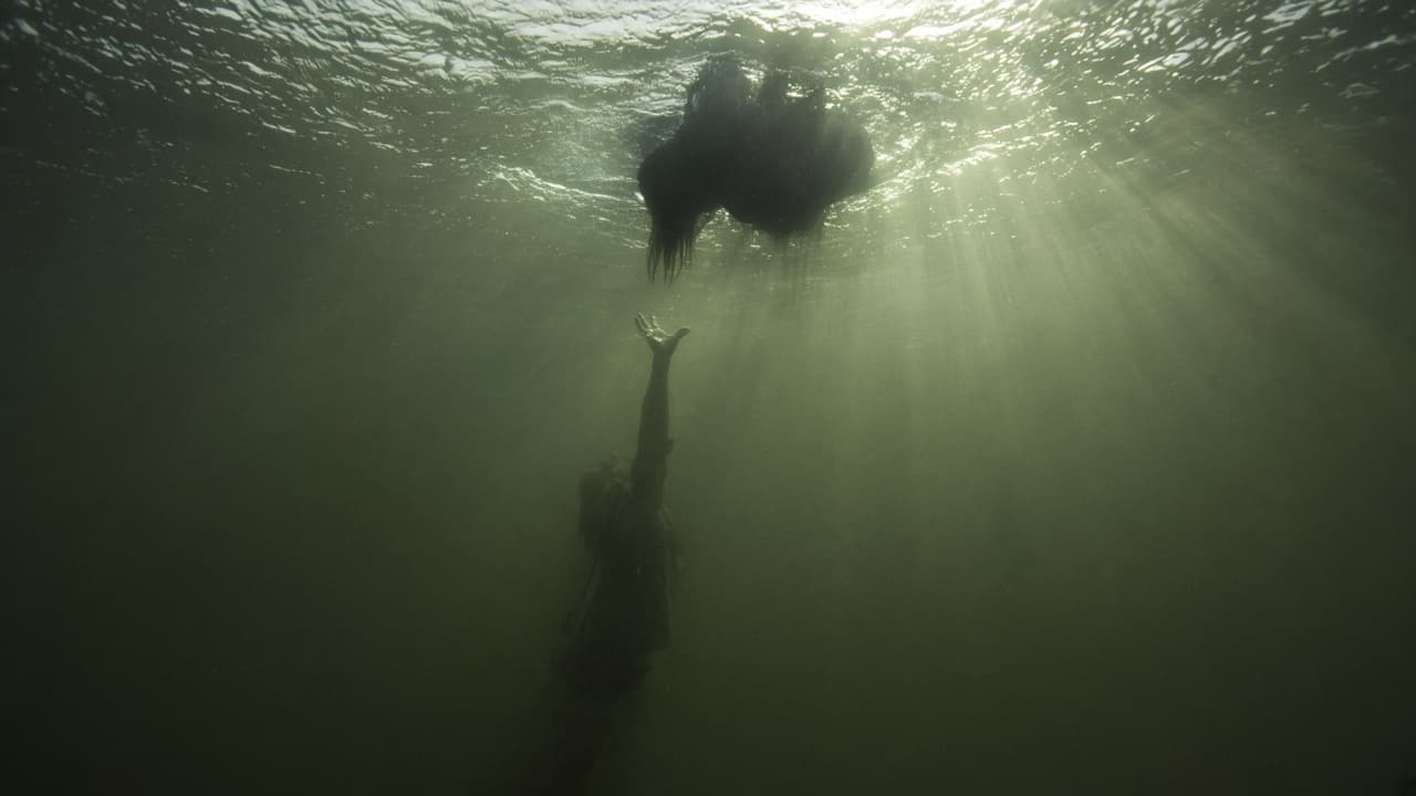 Someone drowning below the surface in a dream